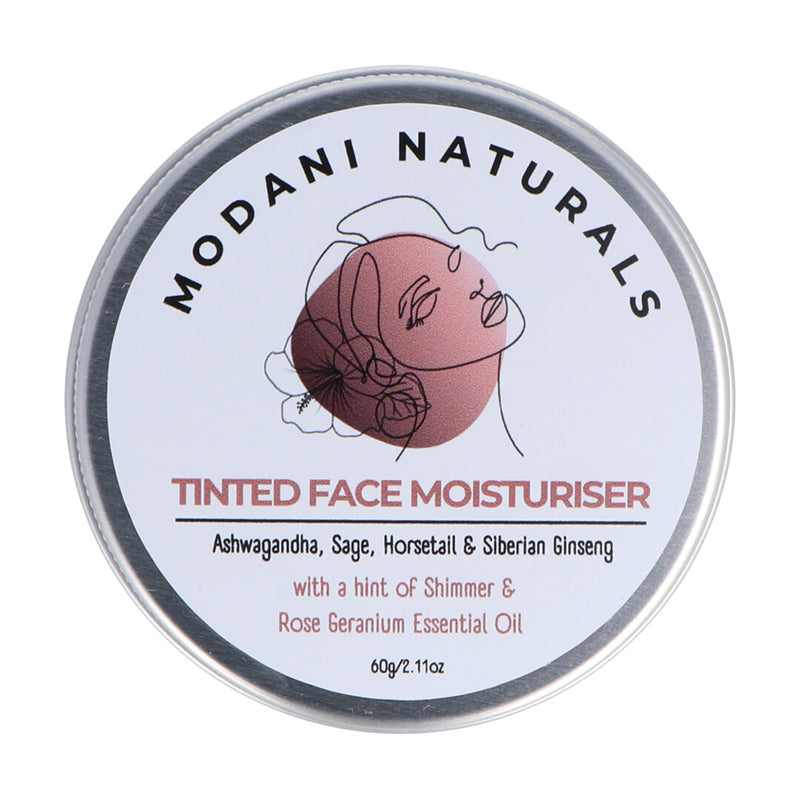 A product image of Modani Naturals Tinted Face Moisturiser, featuring a container with a label that includes a illustration of a face andashwagandha, sage, horsetail and rose geranium essential oil.