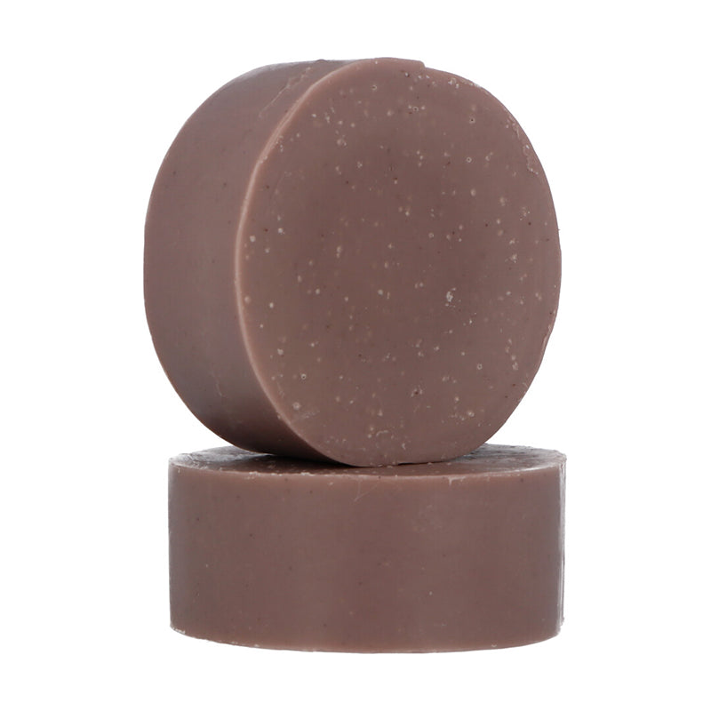 Two purple Wild Yam Face and Body Soaps by Modani Naturals on white background.
