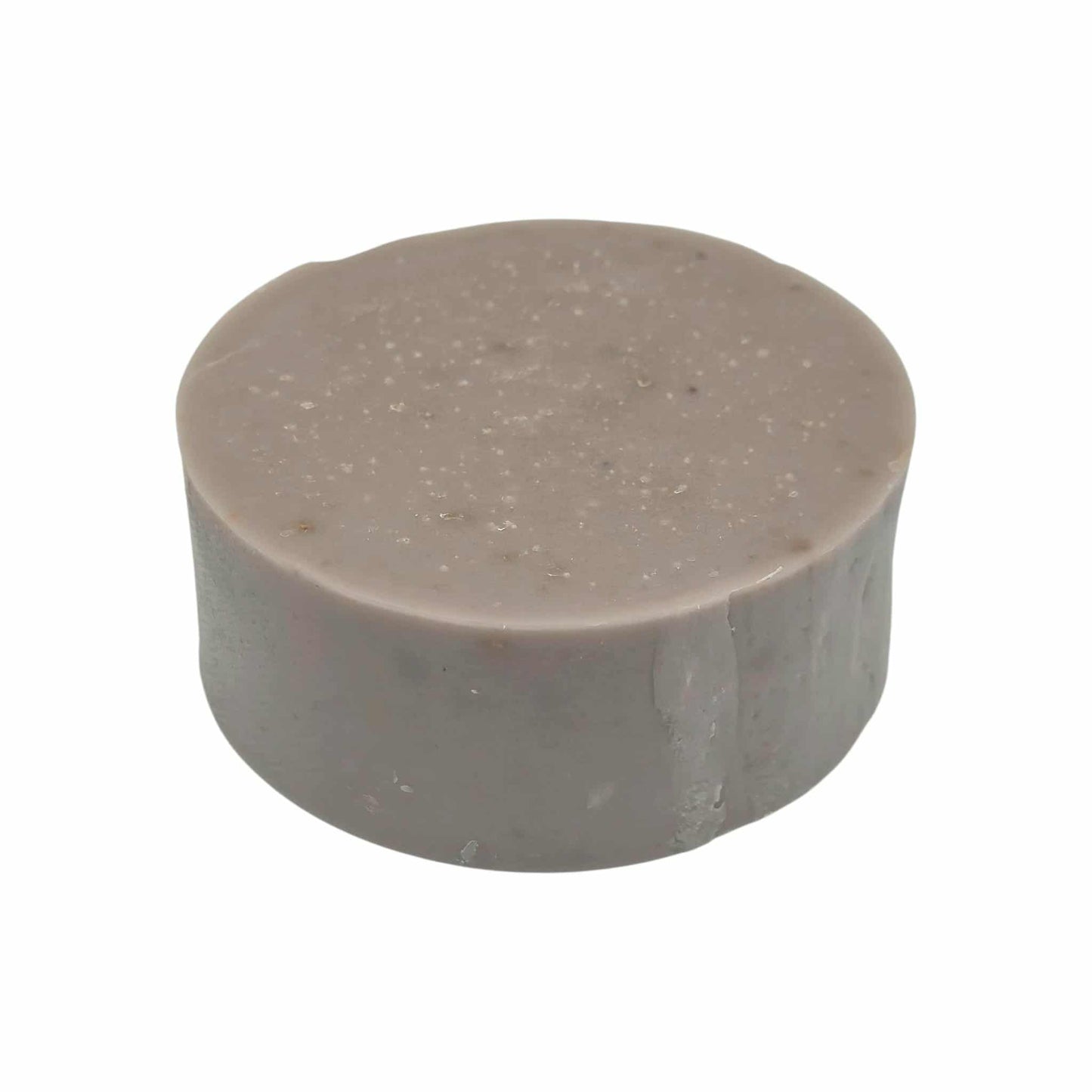 Modani naturals round purple botanical soap on white background.
