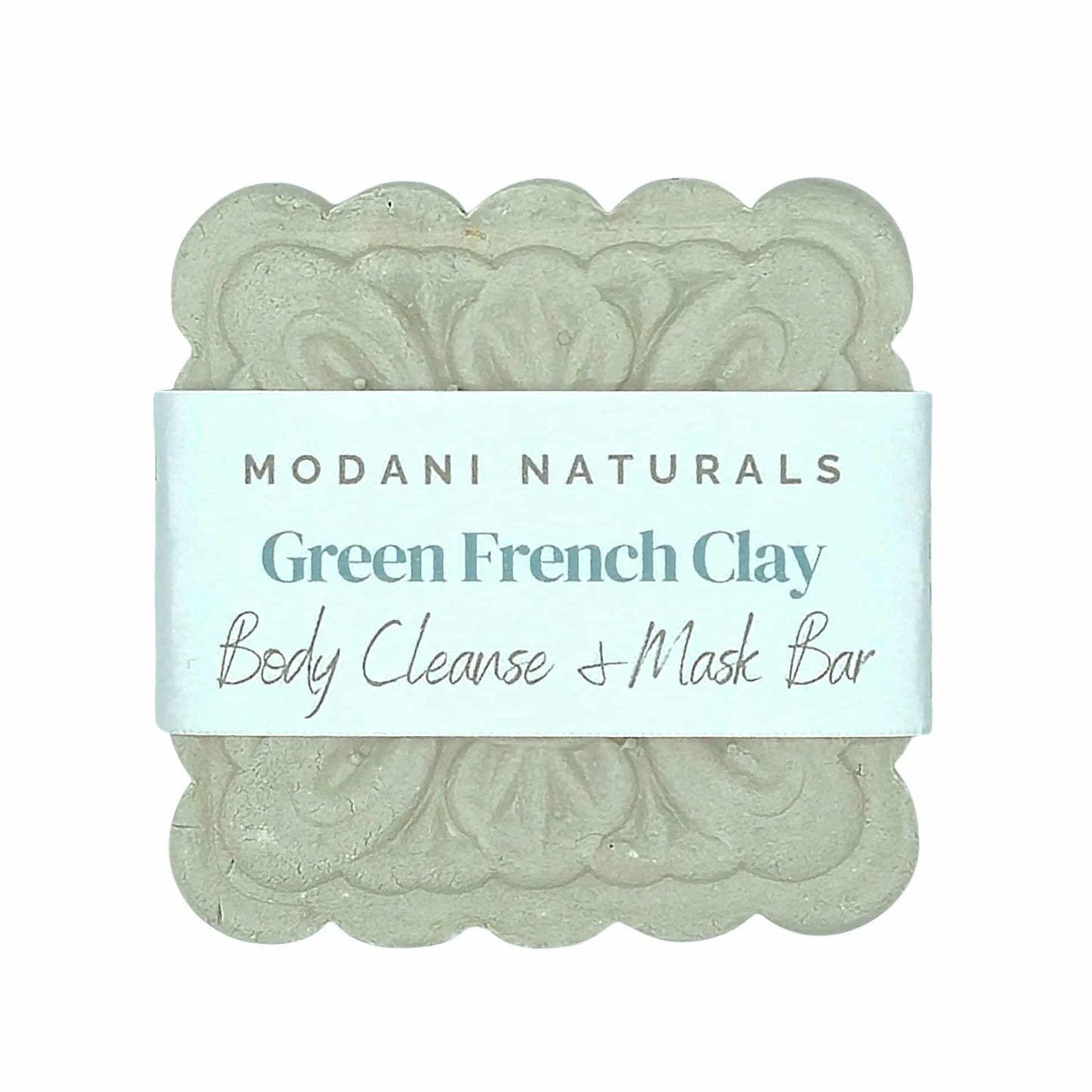 Green French Clay body cleanse and mask bar with 'Modani Naturals' label on a white background