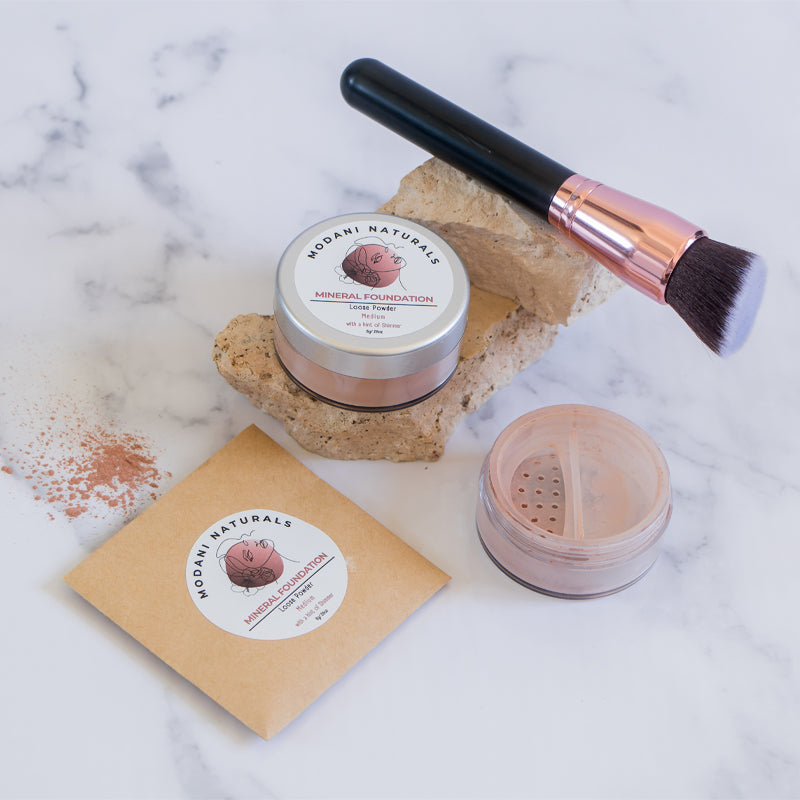 Modani Naturals Mineral Foundation Powder displayed with refill sachet and makeup brush