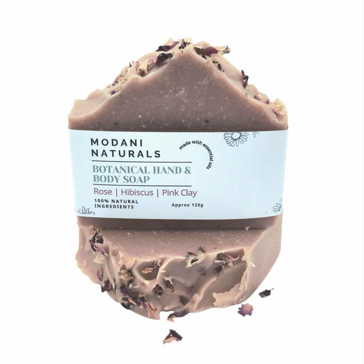 Modani Naturals botanical hand and body soap with visible ingredients on a white background