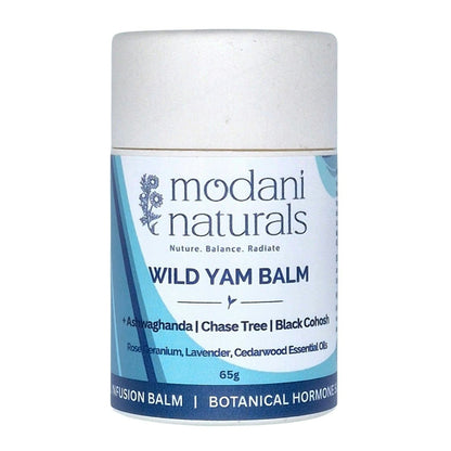 A white cylindrical cardboard push up container of Modani Naturals Wild Yam Balm with a white cap, featuring a blue and white label, on a plain white background.