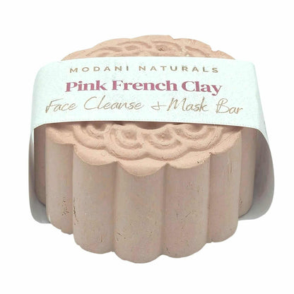 Pink French Clay face cleanse and mask bar with Modani Naturals packaging on a white background