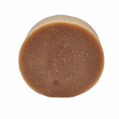 Rose, Hibiscus & pink clay round natural soap on a white background 