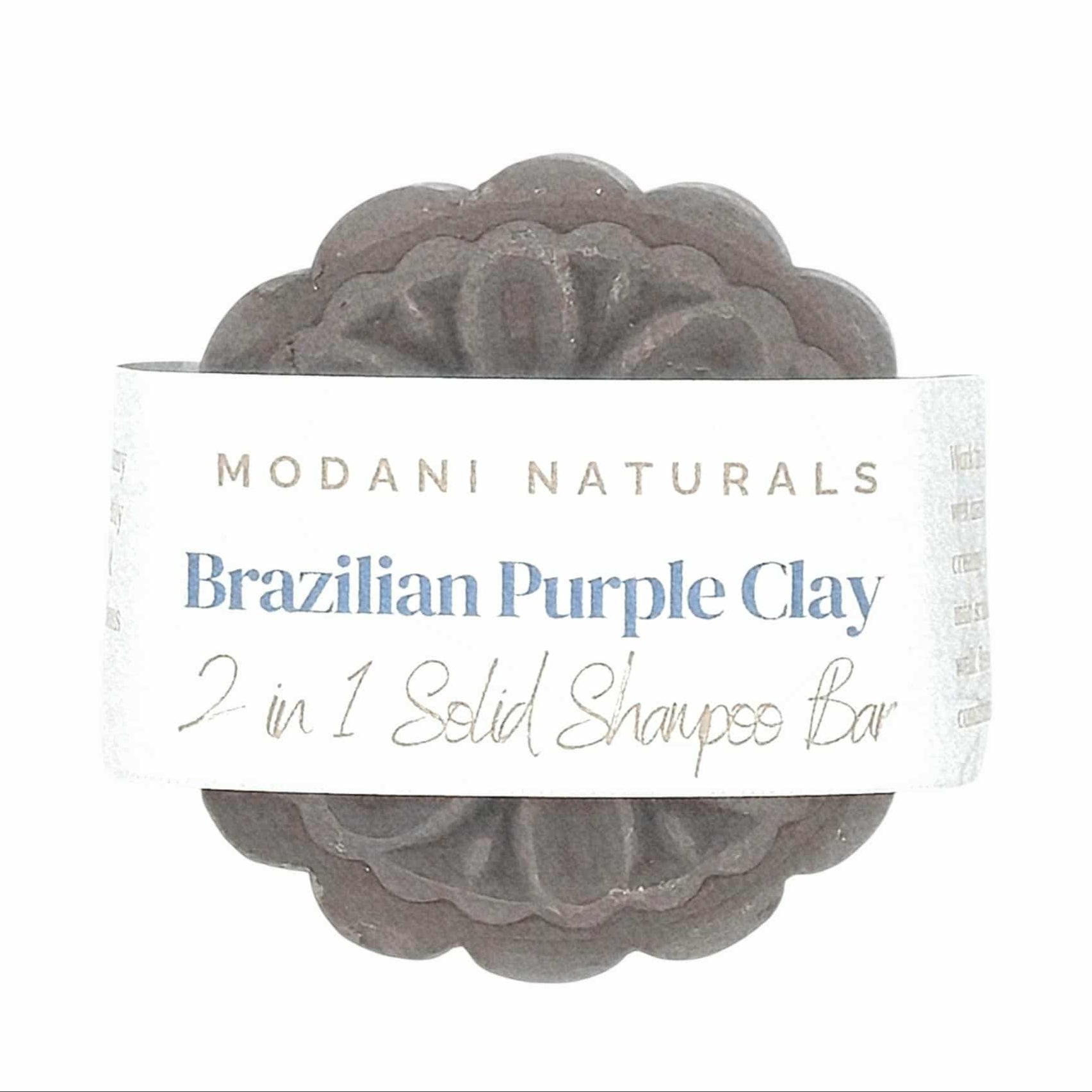 Bar of Brazilian Purple Clay soap with Modani Naturals packaging on a white background