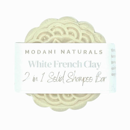 White French Clay 2 in 1 Solid Shampoo Bar with 'Modani Naturals' label on a white background