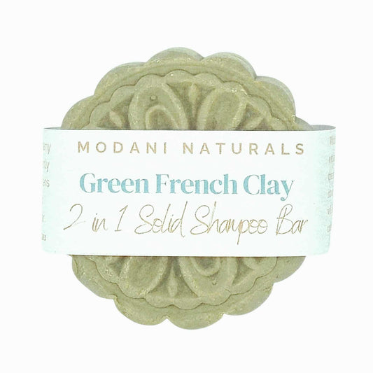 Green French Clay 2-in-1 Solid Shampoo Bar with Modani Naturals label on a white background