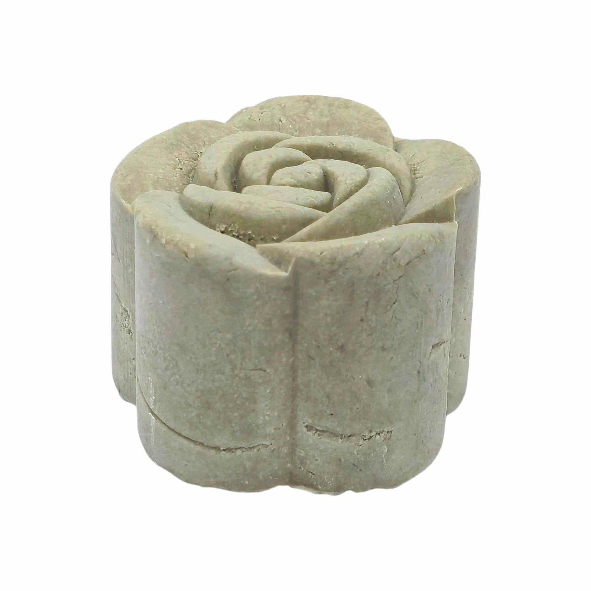 Green solid shampoo bar white background with side view