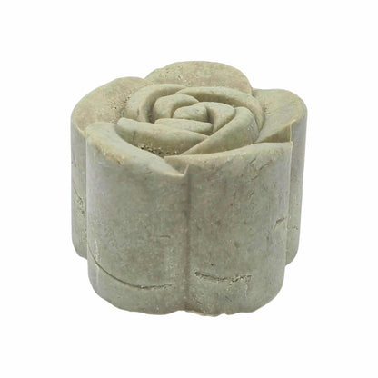 Green solid shampoo bar white background with side view